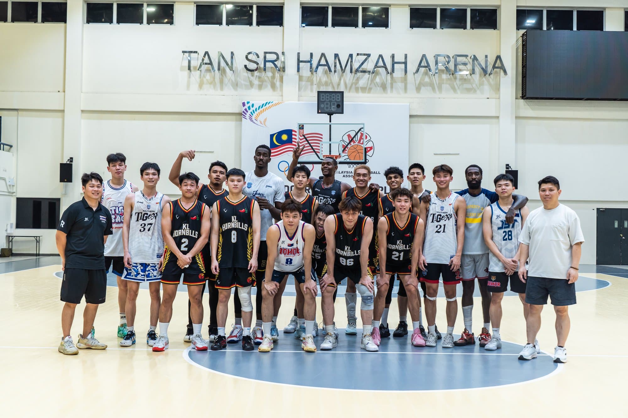 Both squads together after the friendly at Tan Sri Hamzah Arena